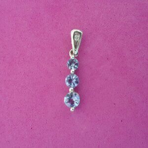 Dainty Tanzanite Pendant set in 10K White Gold